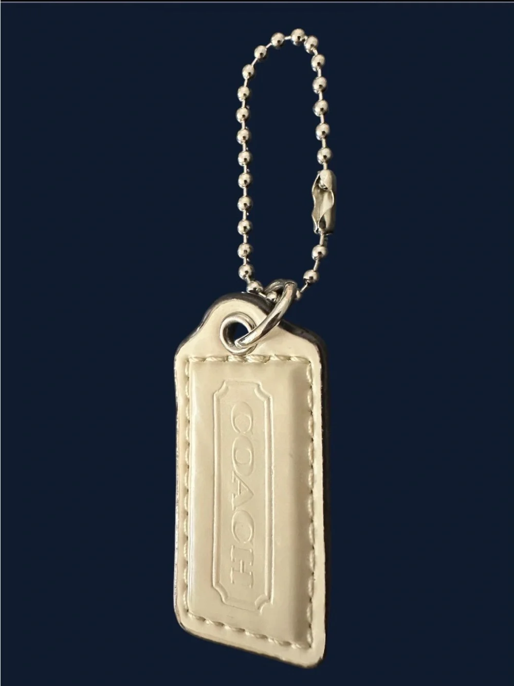 COACH Leather Hangtag | Bag Charm in Cream with Embossed Logo